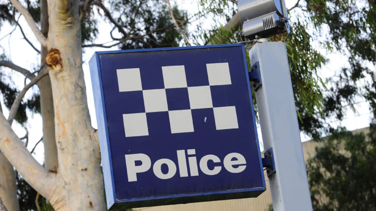 A police station sign