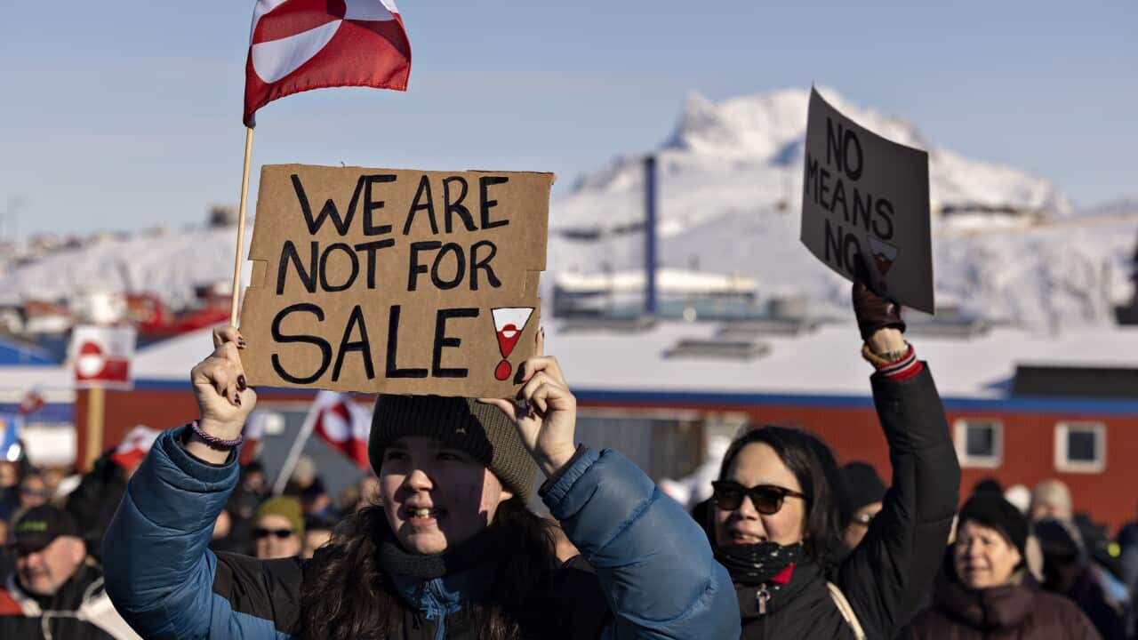 Protestors in front of the US consulate in Nuuk say Greenland belongs to the Greenlandic people (AAP)