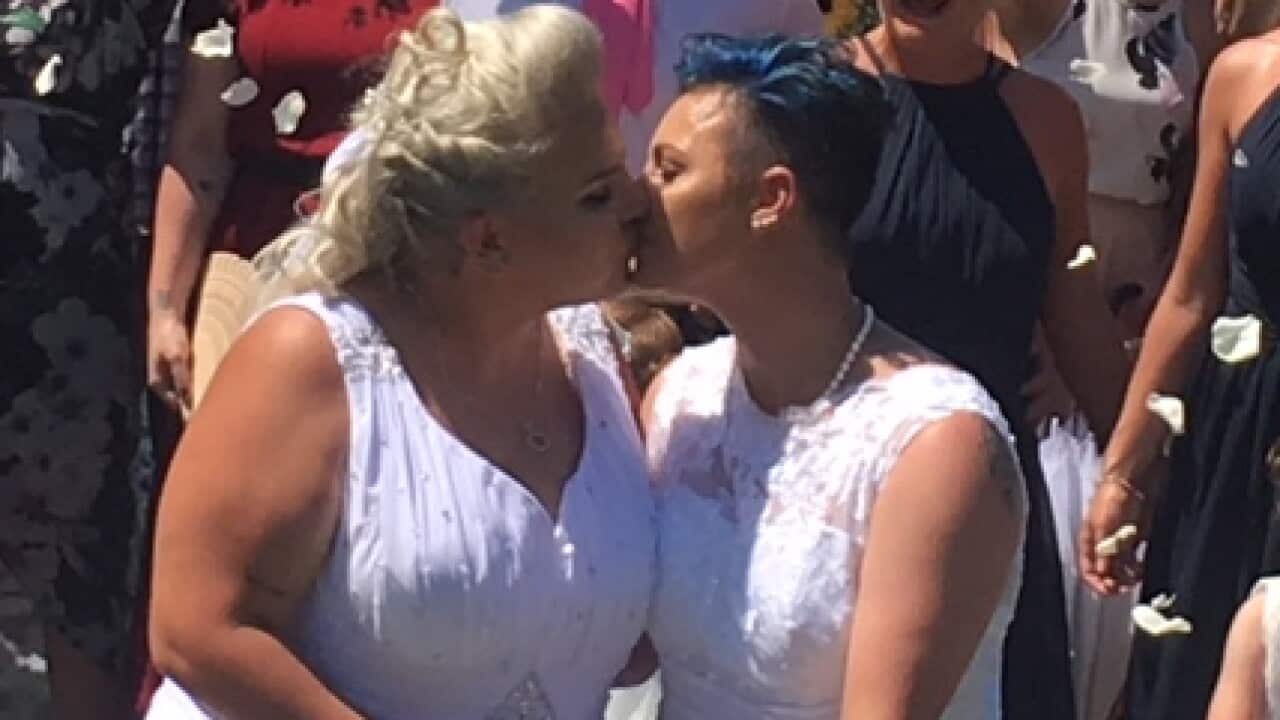 Same-sex couple Lauren Price and Amy Laker walked down the aisle in Sydney.