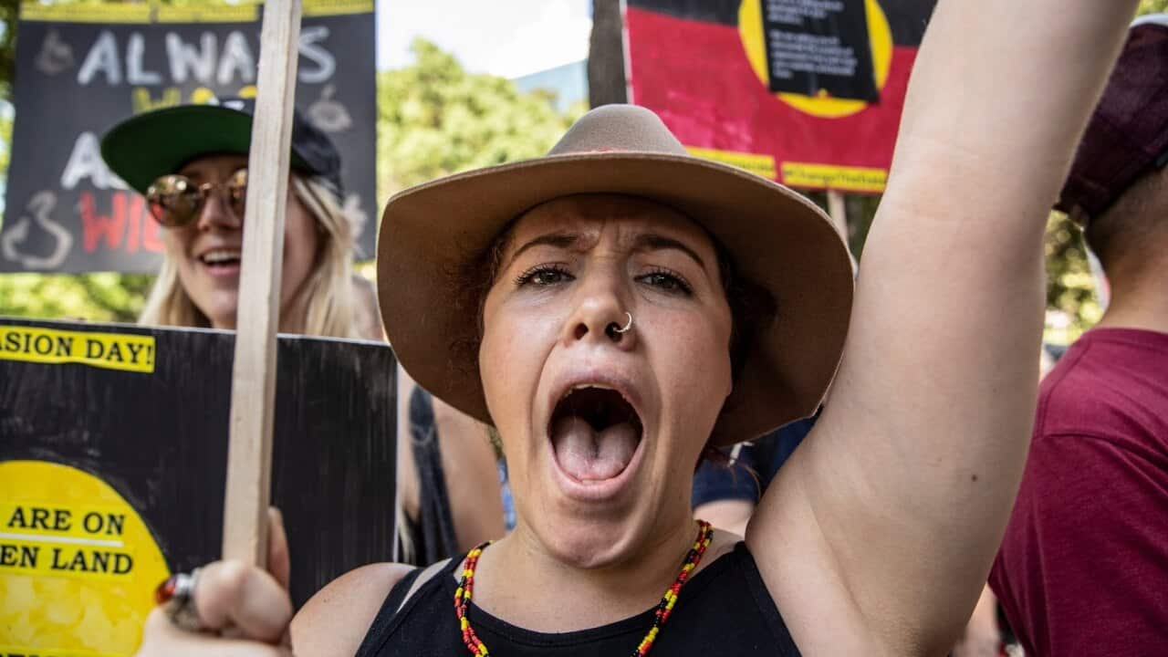 Protestors scream in agreement during speeches, at the Invasion Day March on January 26, 2019 in Sydney.