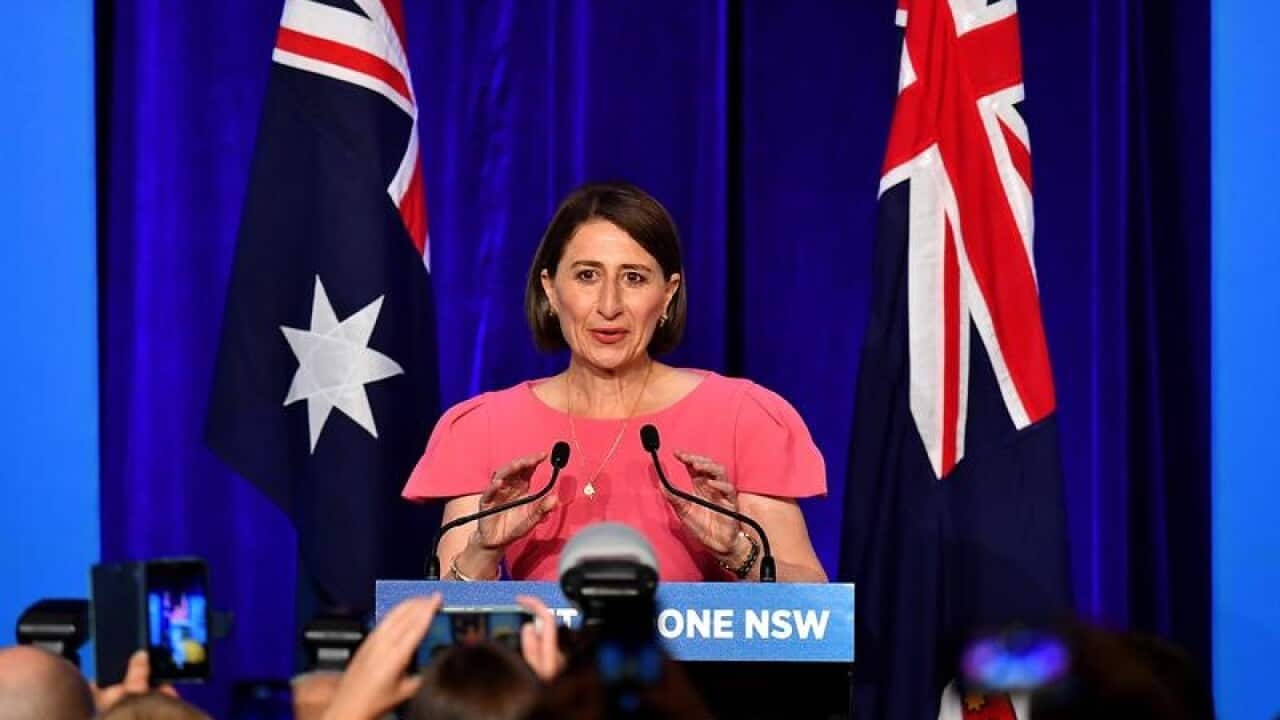 NSW Liberal leader Gladys Berejiklian celebrates her win.