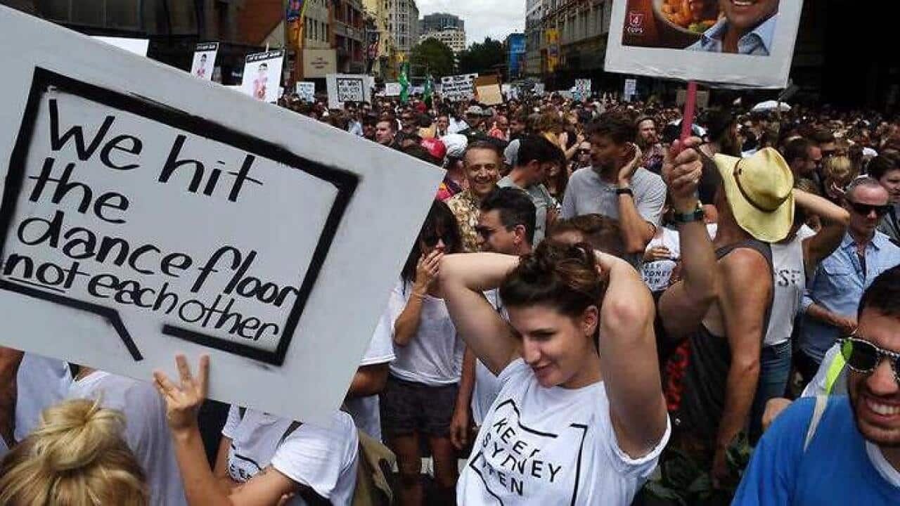 Demonstrators take part in protest rally against the NSW government's lockout laws and impact on nightlife in Sydney, Sunday, Feb. 21, 2016. (AAP)