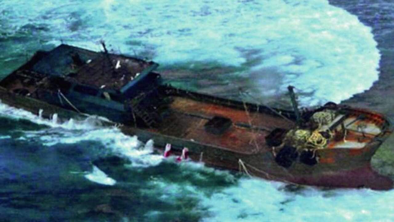 Mystery ship aground Chesterfield reef in the Coral Sea.