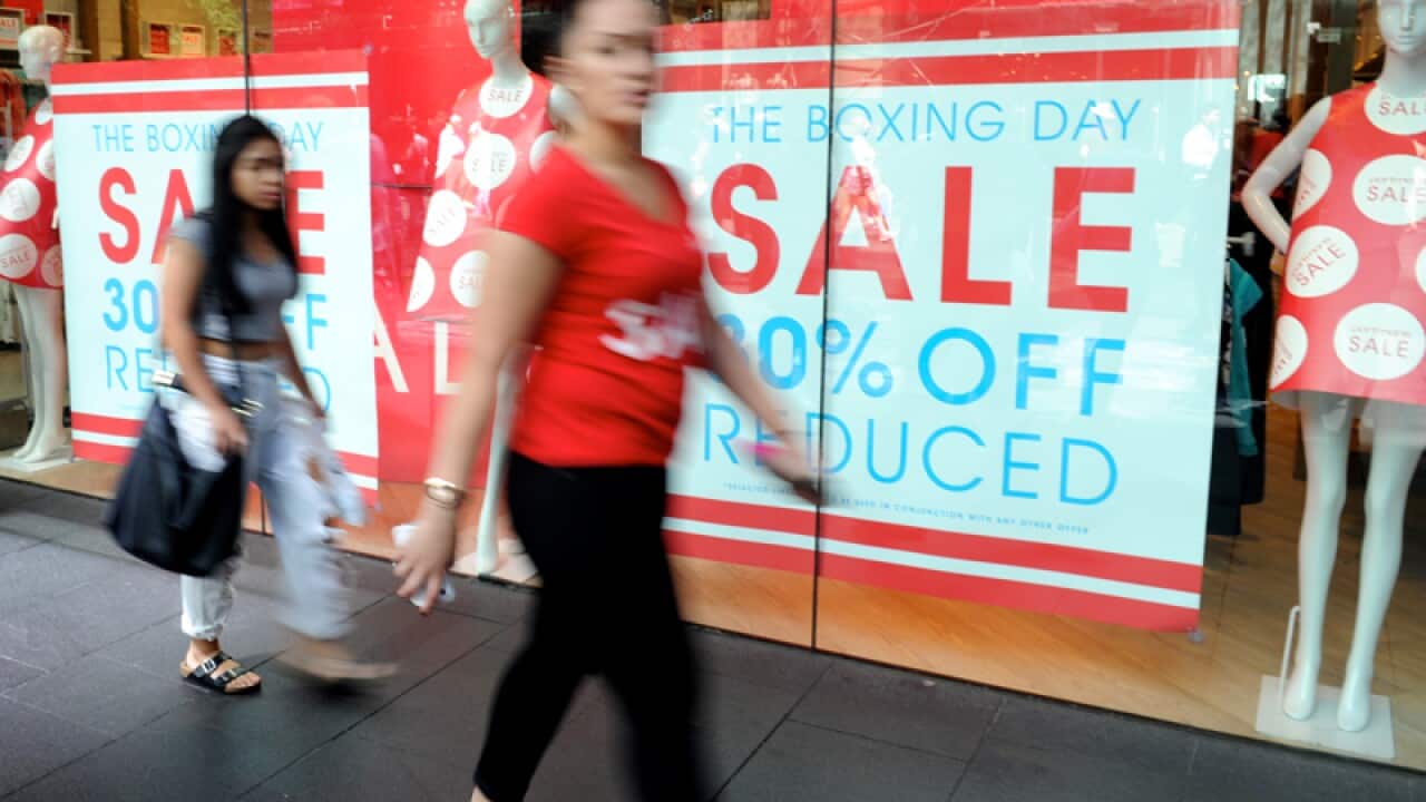 Sales signage at a clothing store