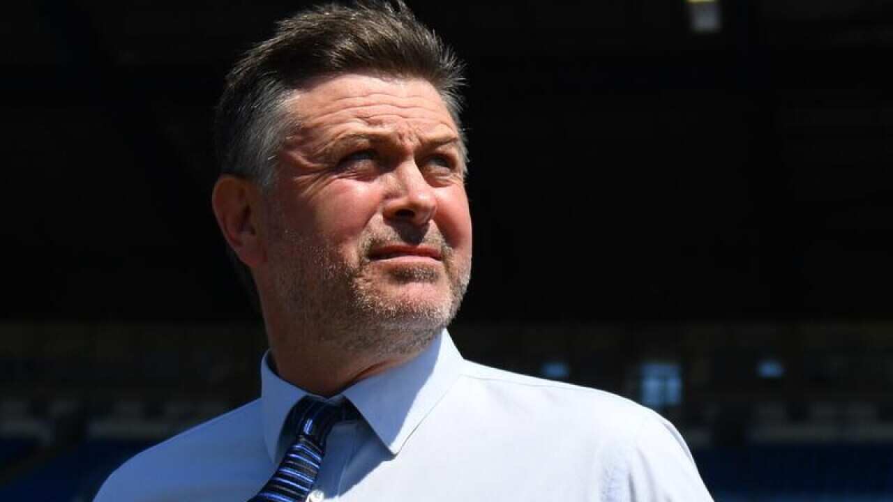 NRL Coach Dean Pay looks on.