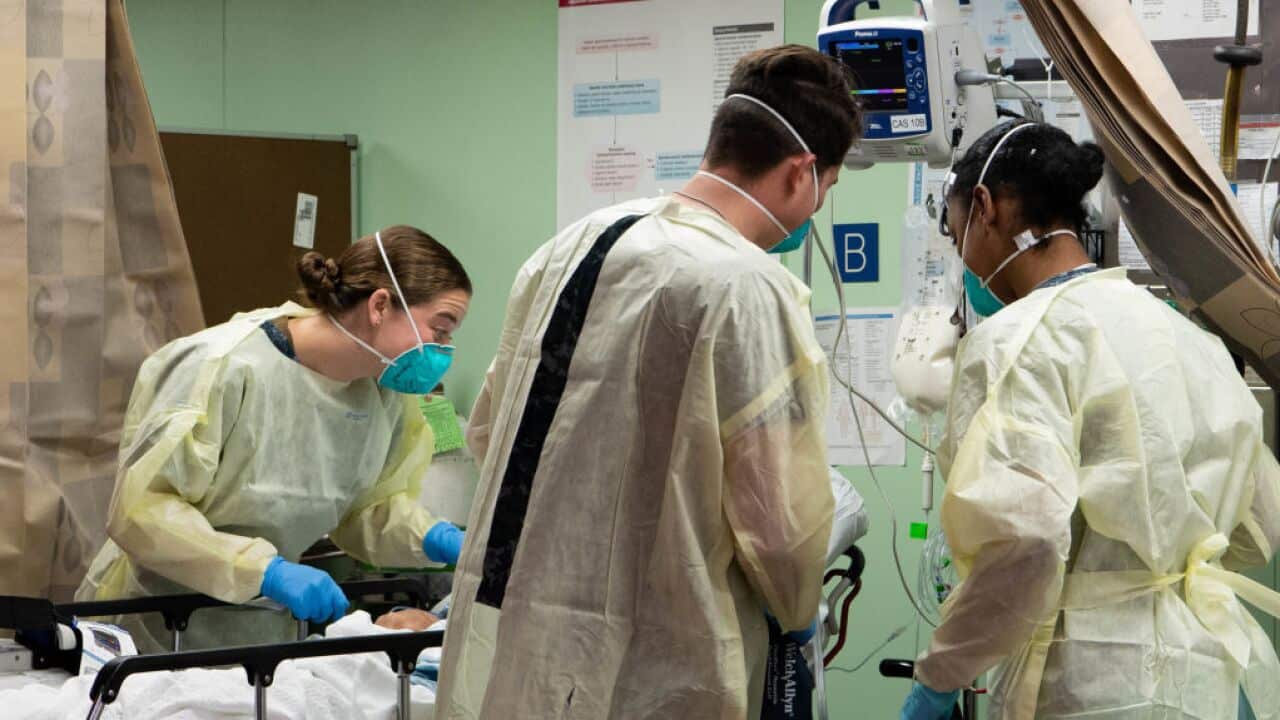 Medical workers help patients fight the virus.