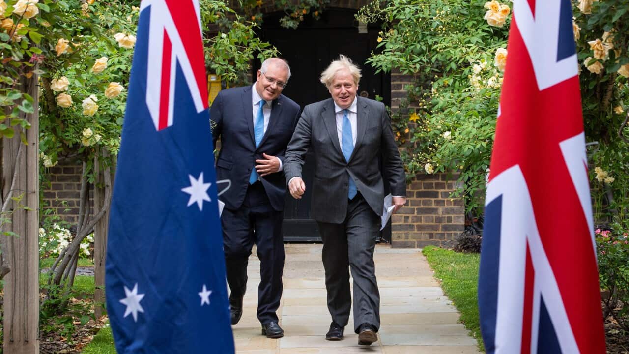 PABEST Prime Minister Boris Johnson with Australian Prime Minister Scott Morrison in the garden of 10 Downing Street, London, after agreeing the broad terms of a free trade deal between the UK and Australia, the UK's first trade deal negotiated fully sinc