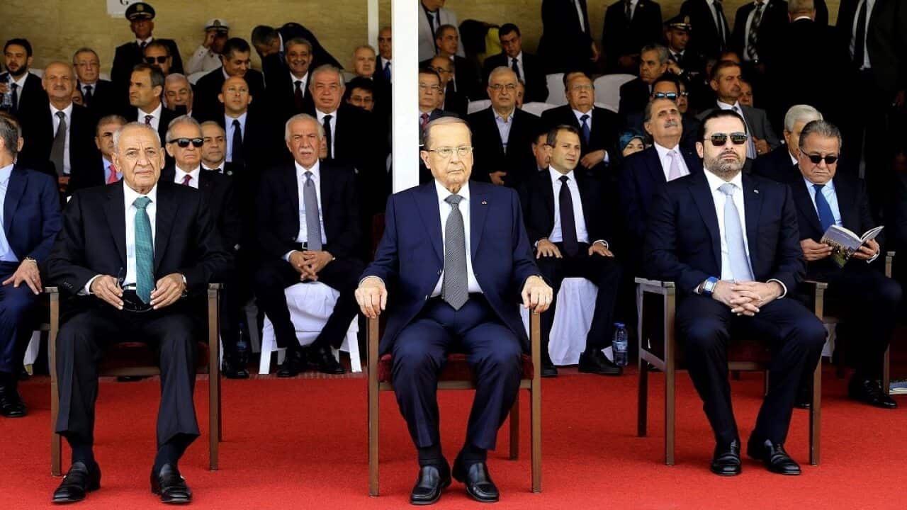 Lebanese President Michel Aoun (C), Prime Minister Saad Hariri (R) and Parliament Speaker Nabih Berri (L).