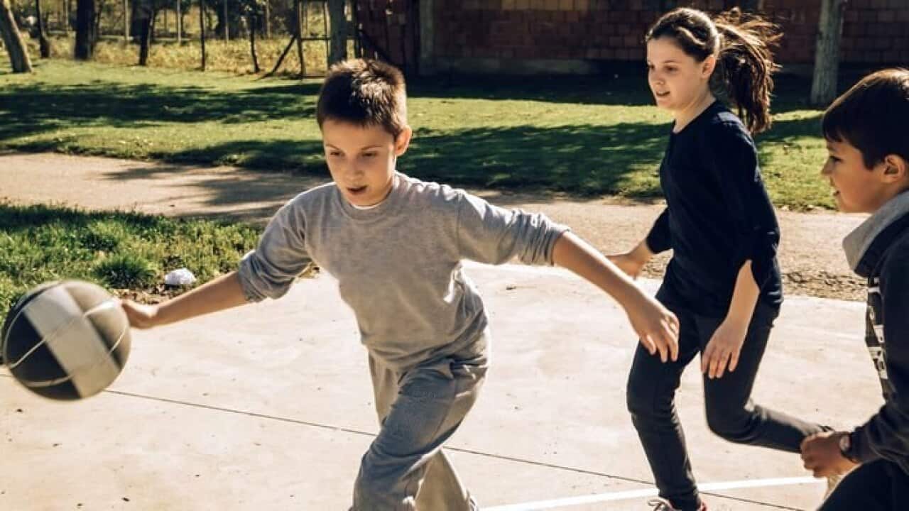 Kids Playing Basketball.