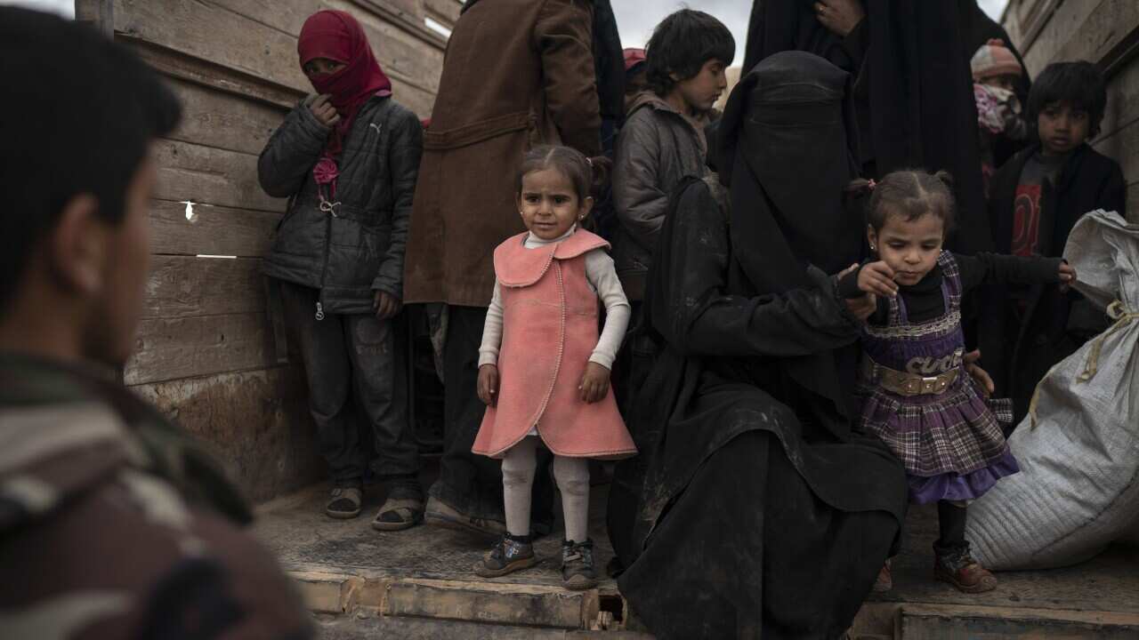 US-backed Syrian Democratic Forces (SDF) fighters in the desert outside Baghouz, Syria, Wednesday, Feb. 27, 2019.