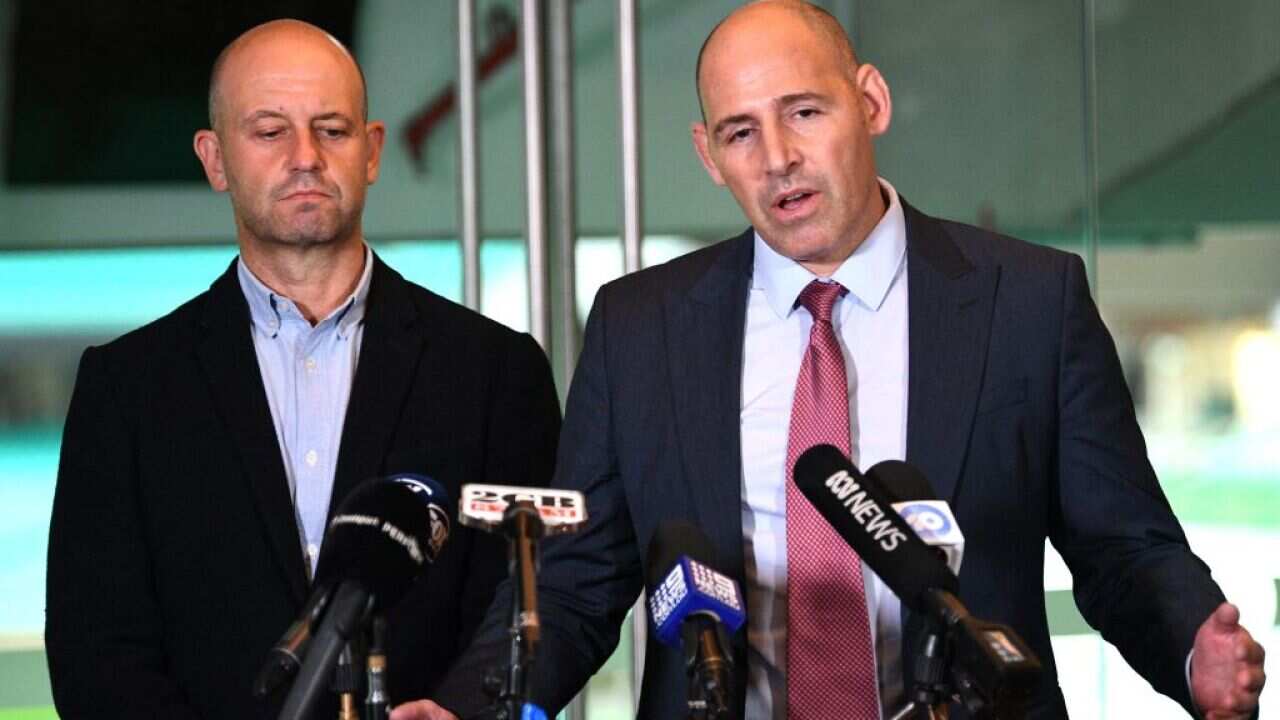 Cricket Australia interim CEO Nick Hockley (R) and Australian Crickters' Association CEO Todd Greenberg (L) during a press conference in Sydney on 5 May, 2021.