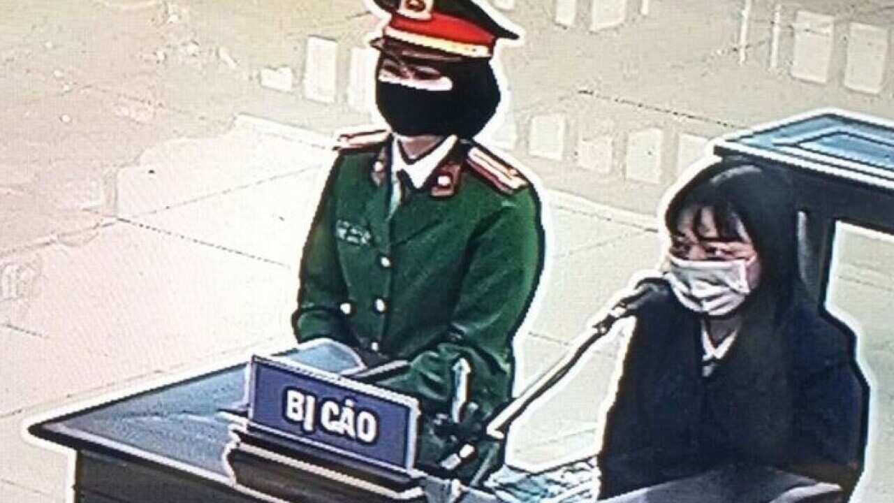 Pham Đoan Trang at Hanoi court on 14/12/2021, photo taken thru screen