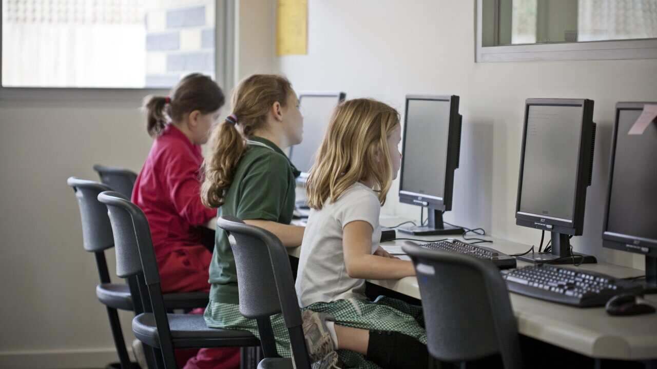 School children in classroom.