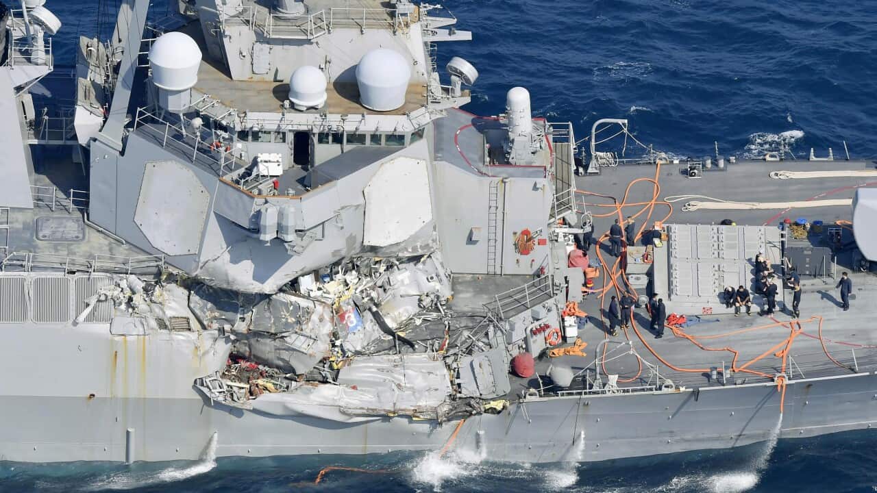 The damage of the right side of the USS Fitzgerald is seen off Shimoda, Shizuoka prefecture, Japan, after the Navy destroyer collided with a merchant ship