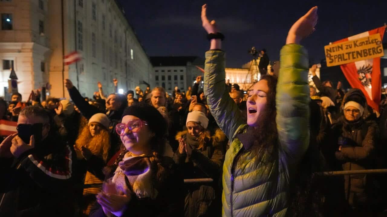 Anti-lockdown protesters shout slogans in Vienna, Austria