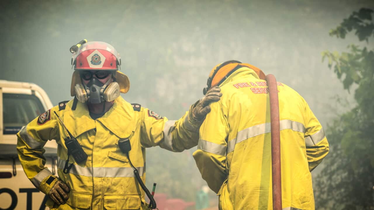firefighters fighting a bushfire in the Perth Hills