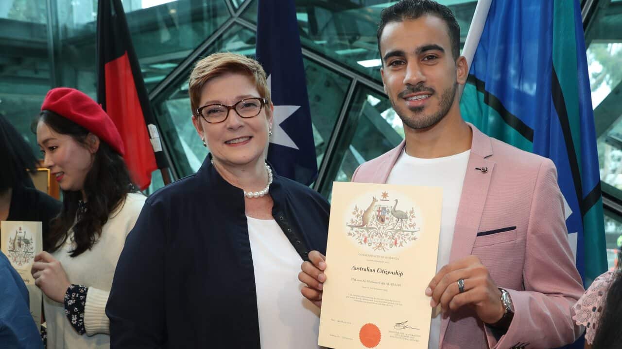 Minister for Foreign Affairs Marise Payne and refugee footballer Hakeem Al-Araibi at his Australian citizenship ceremony.