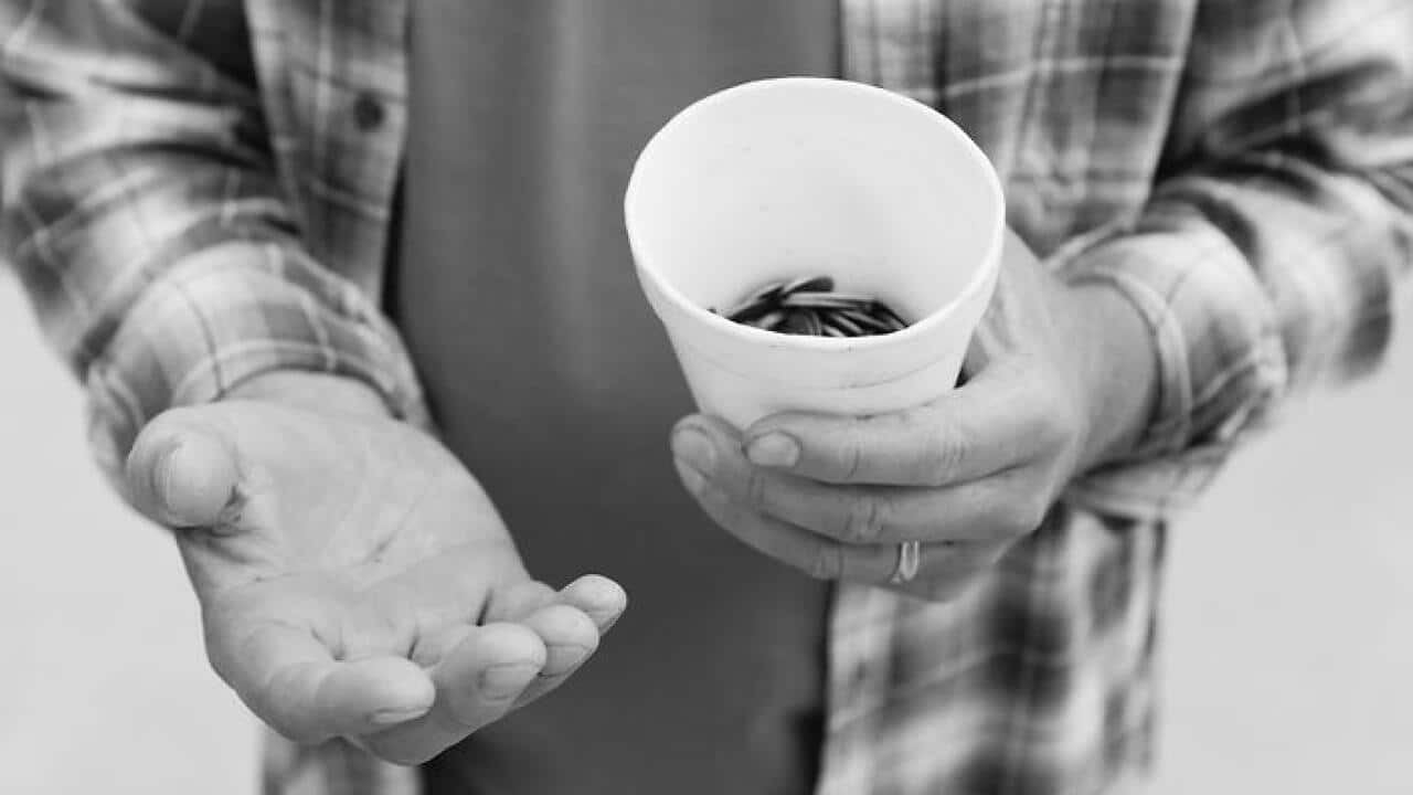 USA, Illinois, Metamora, Close-up of man begging for money