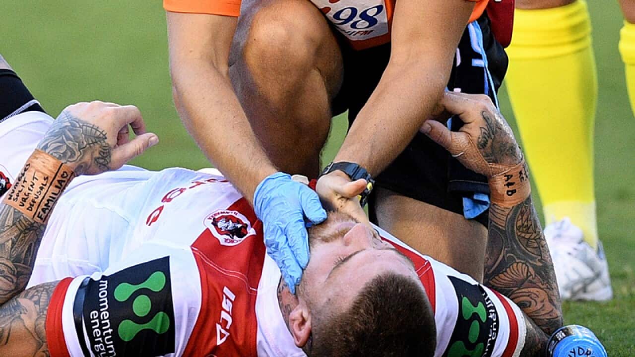 Josh Dugan of the Dragons receives attention