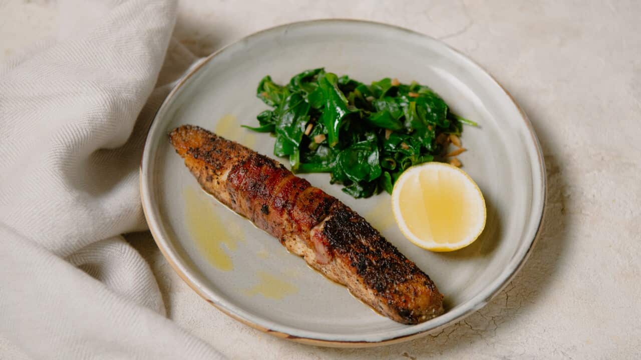 Bacon-wrapped barramundi