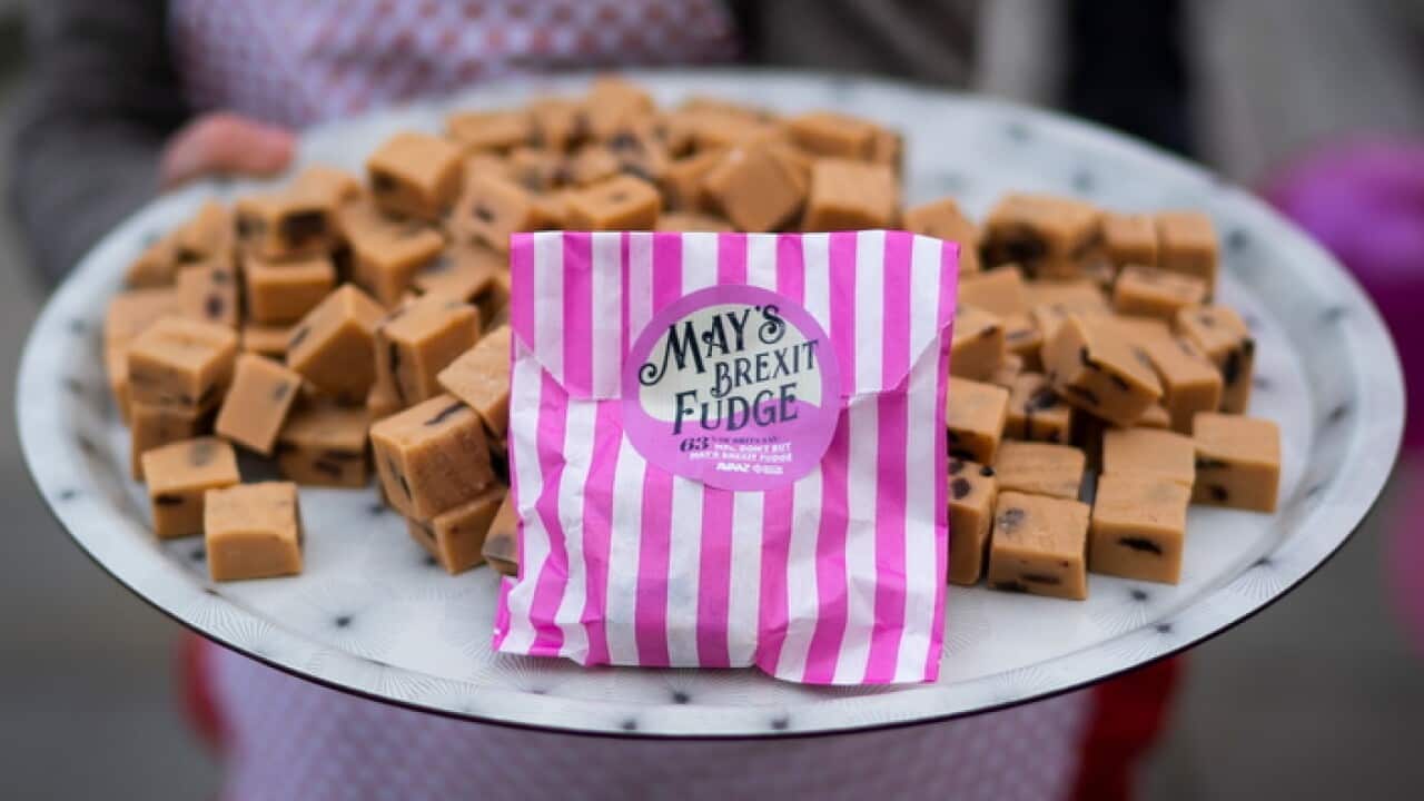 An anti-Brexit protester carrying sweets outside Houses of Parliament in Central London