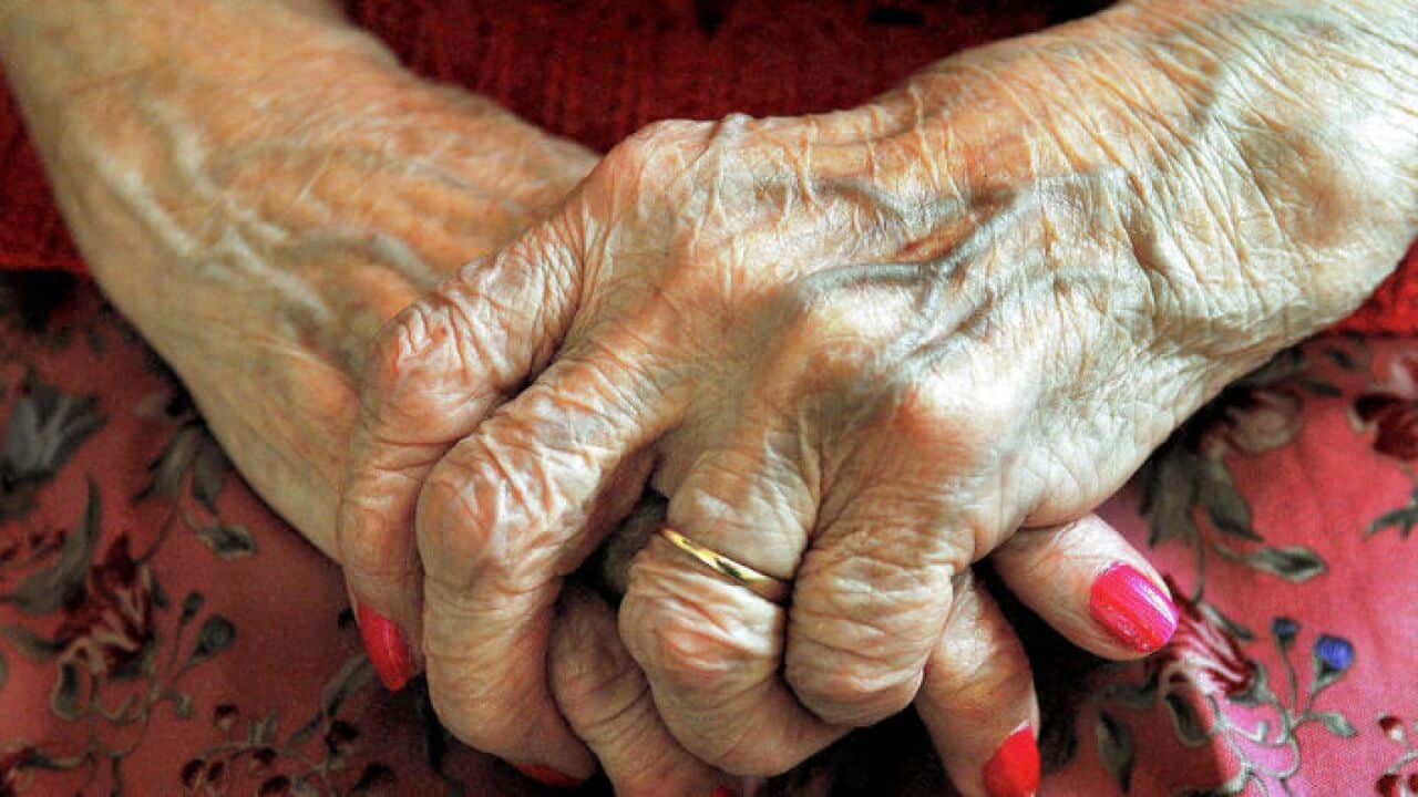 Hands of elderly person