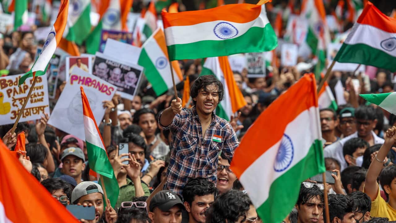 Supporters of CJP celebrate the resignation of Education Minister in Mumbai