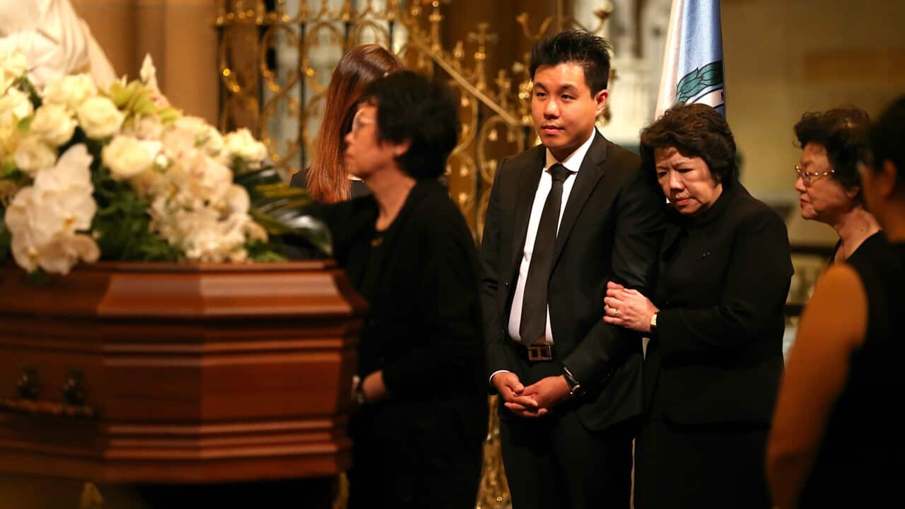 Alpha Cheng at his father's funeral