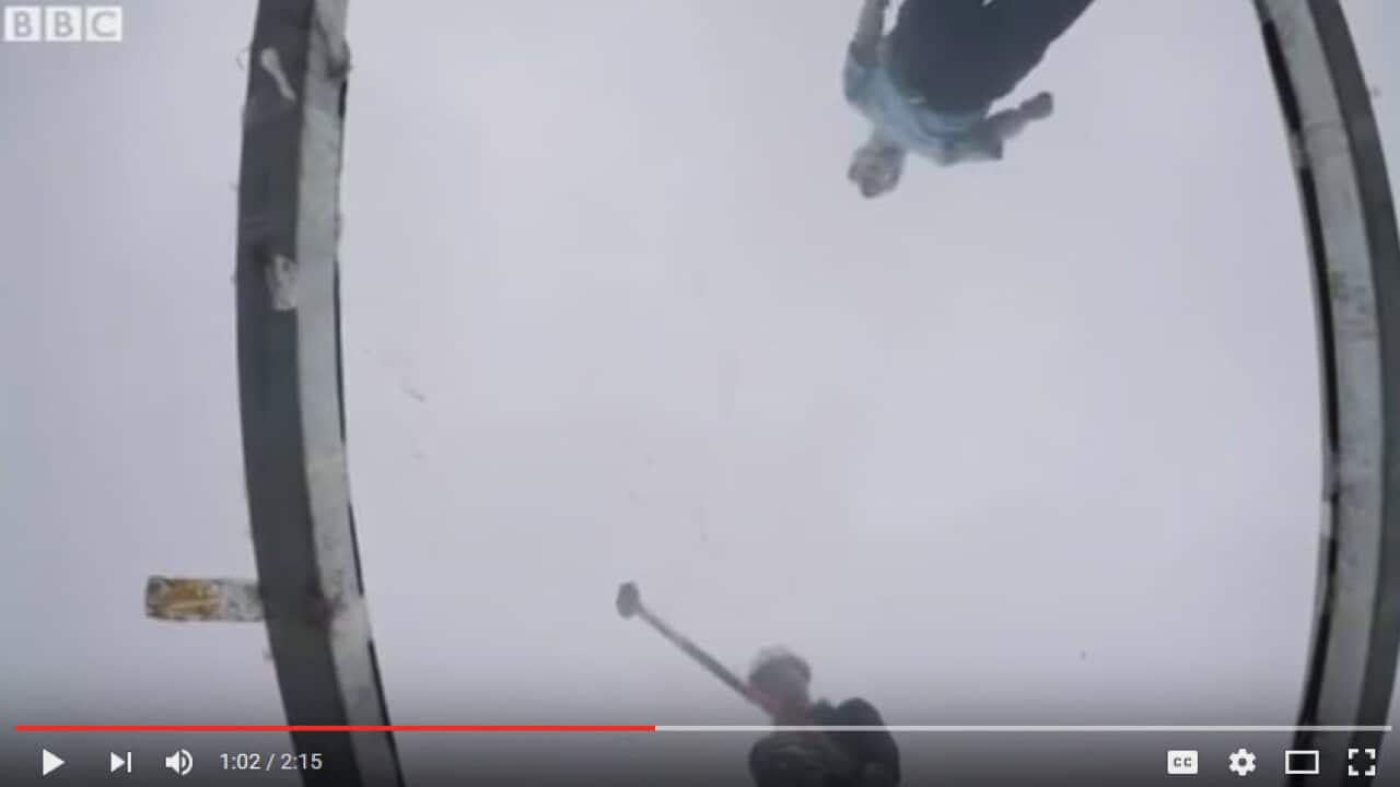 Safety Test: China's giant glass bridge hit with sledgehammer by BBC Technology Reporter