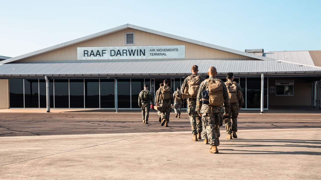 US Marines walk towards the Darwin base
