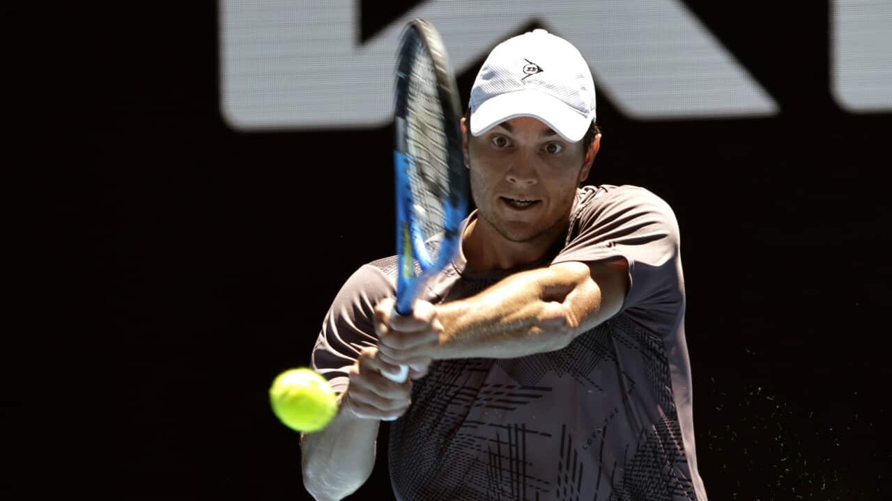 Miomir Kecmanovic of Serbia in action during his Men's Singles round 2 match against Hubert Hurkacz of Poland at the Australian Open in Melbourne