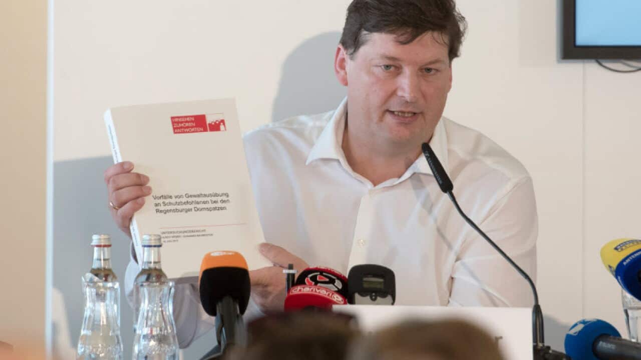 lrich Weber, a lawyer tasked with shedding light on the Regensburg Cathedral abuse case, speaks at a press conference at which the release of the final report