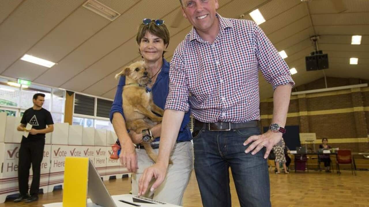 LNP MP Scott Emerson voting with his wife Robyn in Saturday's election
