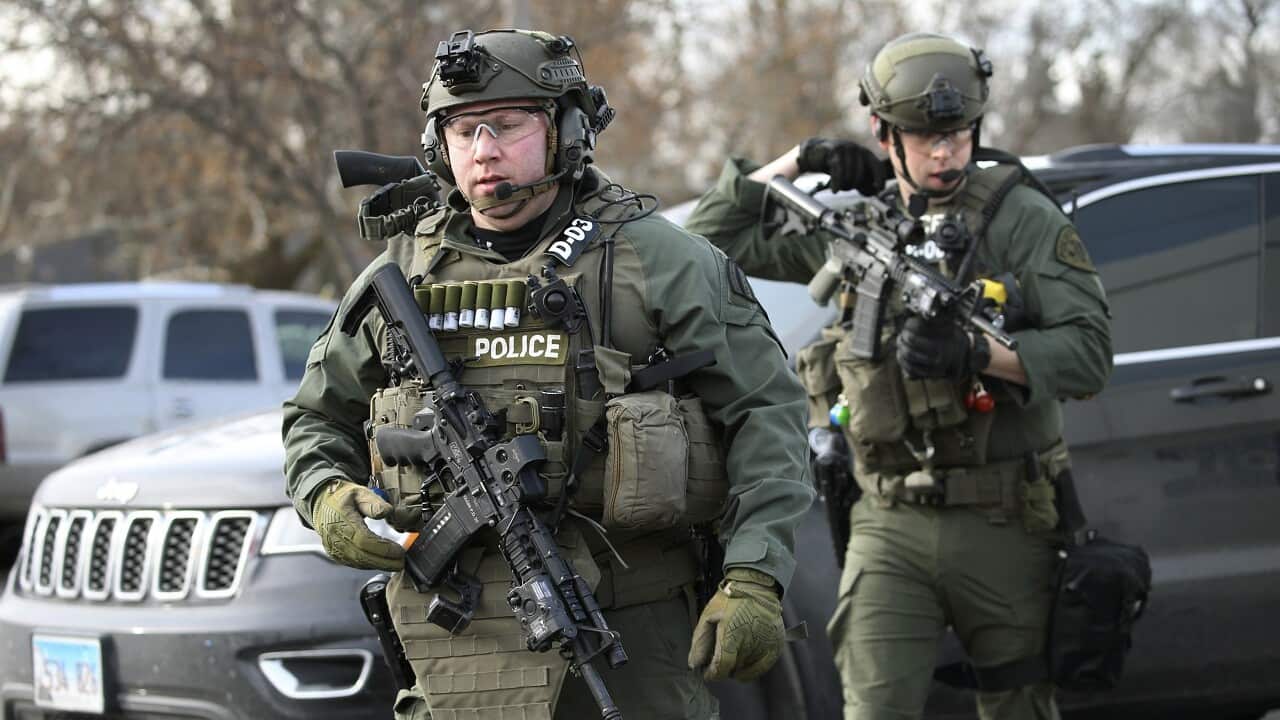 Police officers near the scene.