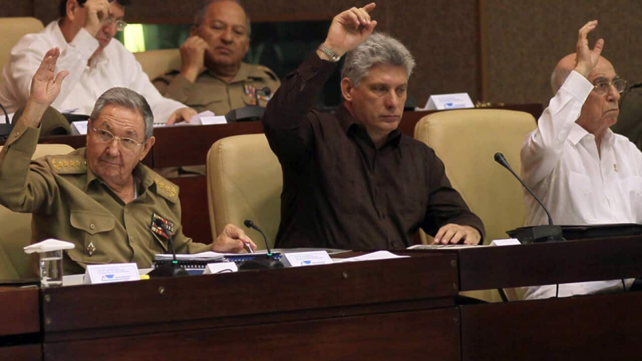 Cuba's President Raul Castro (L) at the National Assembly in Havana