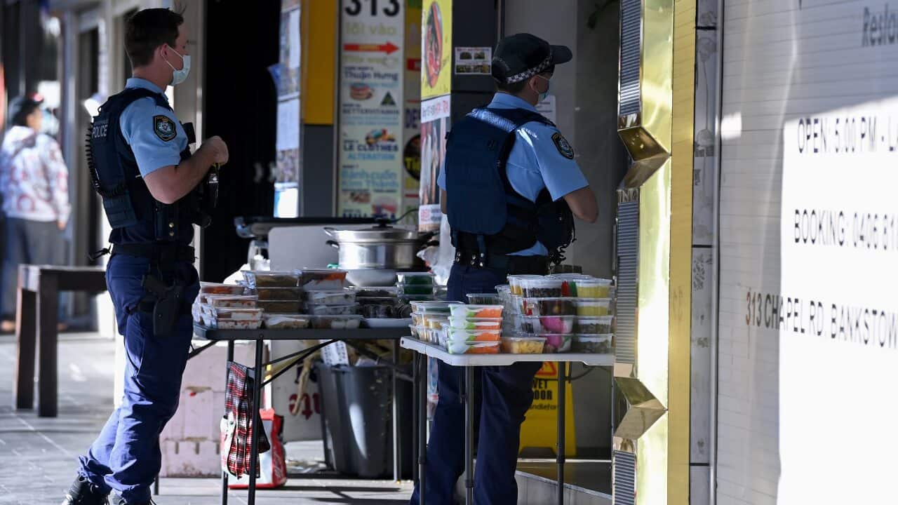 NSW Police Officers patrol the main shopping district of Bankstown, Sydney.