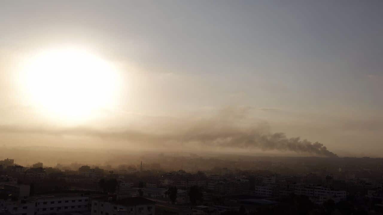 Smoke from an Israeli strike rises in the air over Gaza City early this morning. (AFP)