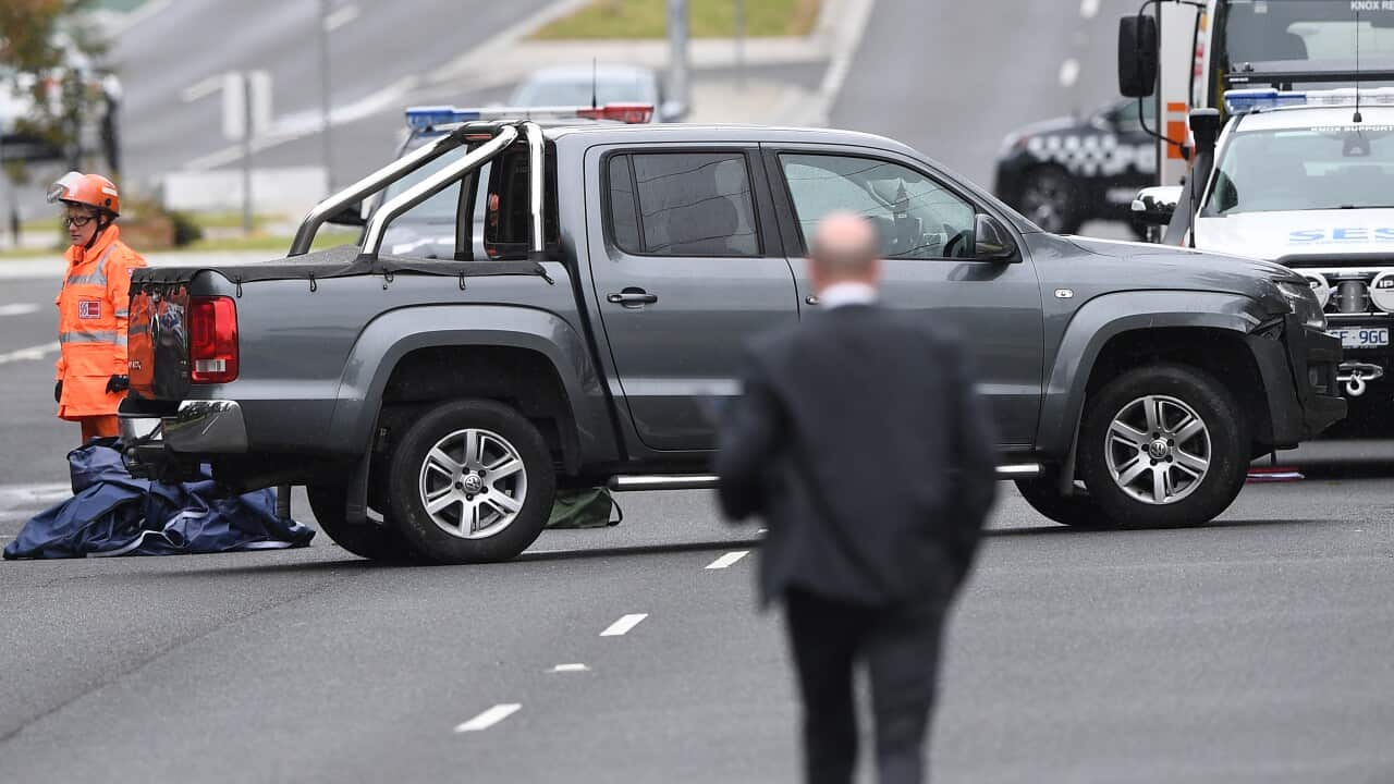 An SUV is seen on The Mountain Highway in Bayswater in Melbourne, Saturday, November 9, 2019. A man was found dead in a van on the Eastlink Freeway afer an overnight shooting. (AAP Image/Julian Smith) NO ARCHIVING