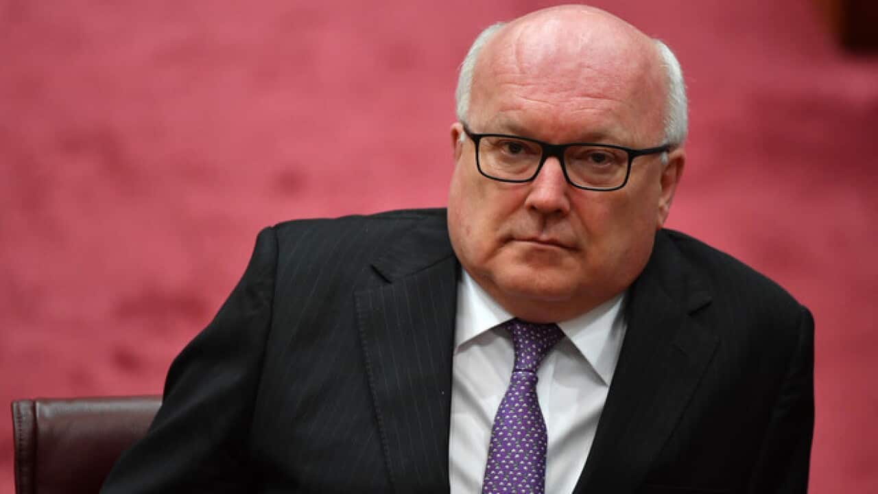 Attorney-General George Brandis during an amendment to part 18c of the Racial Discrimination Act in the Senate chamber at Parliament House in Canberra, Thursday, March 23, 2017. (AAP Image/Mick Tsikas) NO ARCHIVING