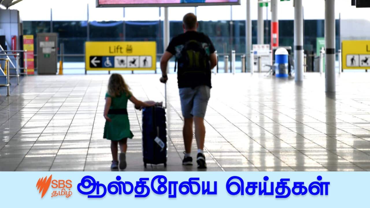 Departing passengers make their way to the domestic terminal in Brisbane airport