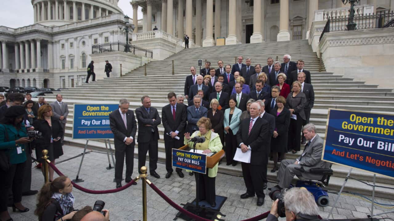 Democratic senators speak on the Senate steps outside the US Capitol