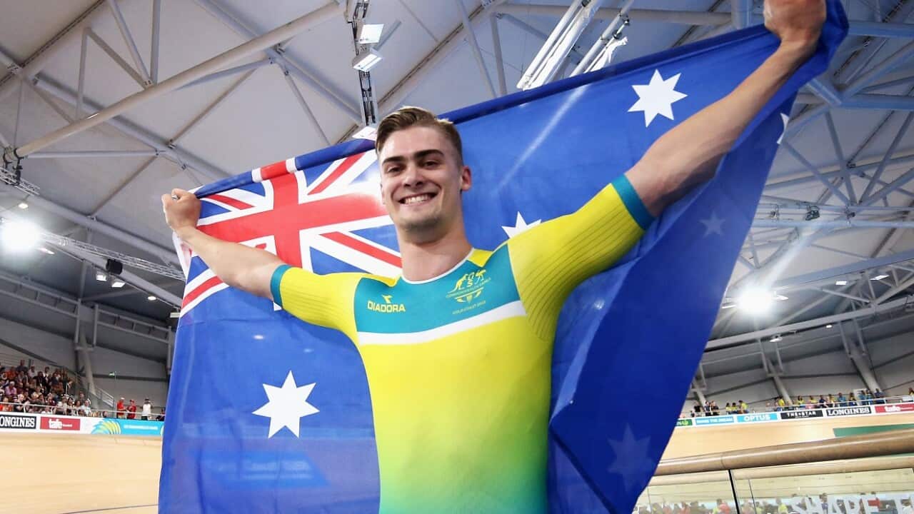Matt Glaetzer celebrates a games record time after he competes and wins the Men's 1000m Time Trial.