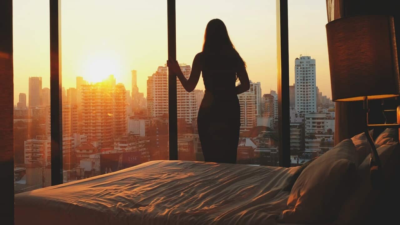 Silhouette Of Woman Staring Out At Beautiful World