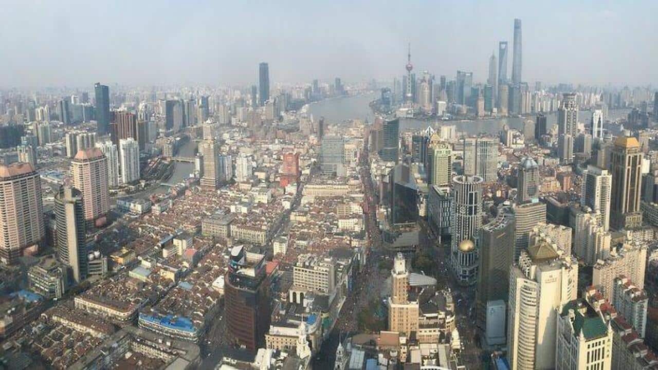 Shanghai plans to limit its population.