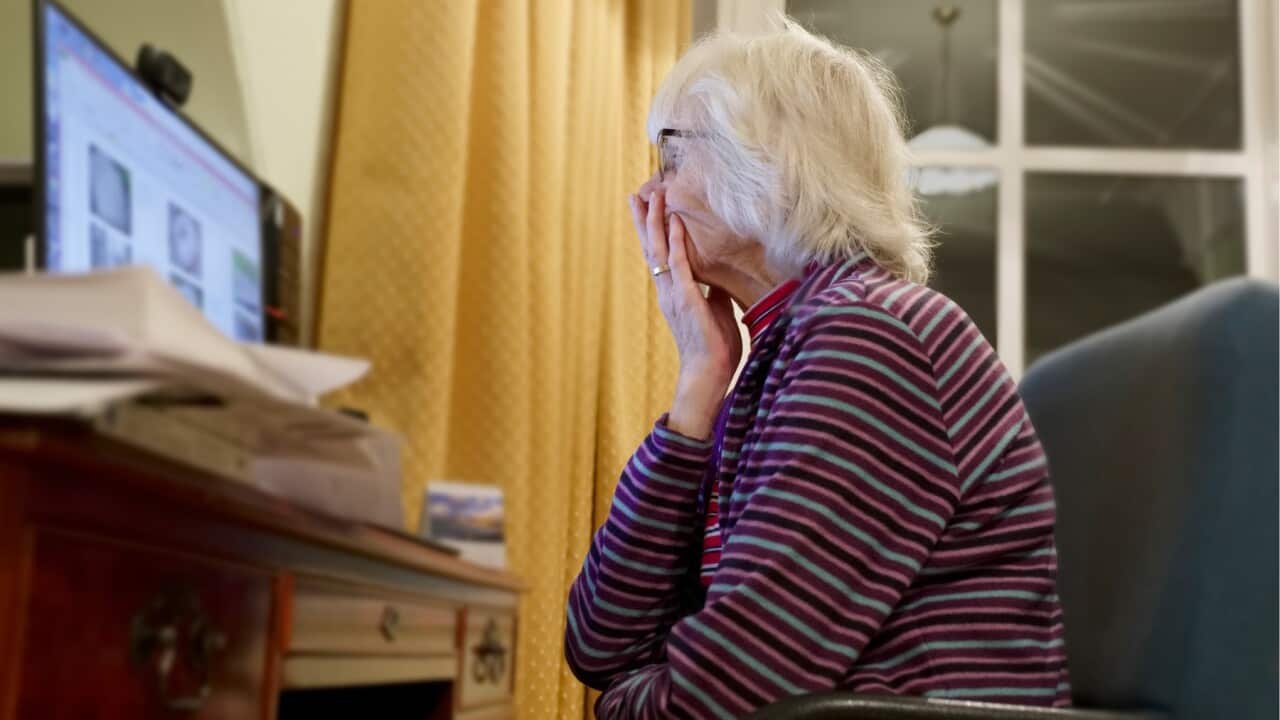 Old elderly senior person learning computer and online internet skills protect money scam and fraud