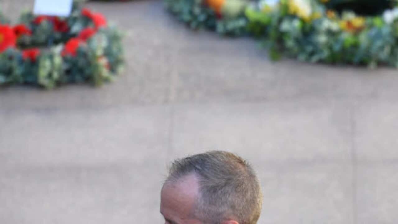 Leader of the Opposition Bill Shorten and Prime Minister Scott Morrison at the Last Post Ceremony at the Australian War Memorial in Canberra, Monday, February 11, 2019 (AAP)
