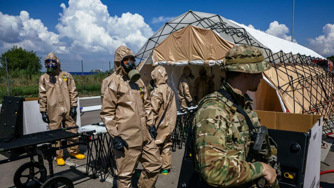 Ukrainian Emergency Ministry rescuers attend an exercise in case of a possible nuclear incident at the Zaporizhzhia power plant