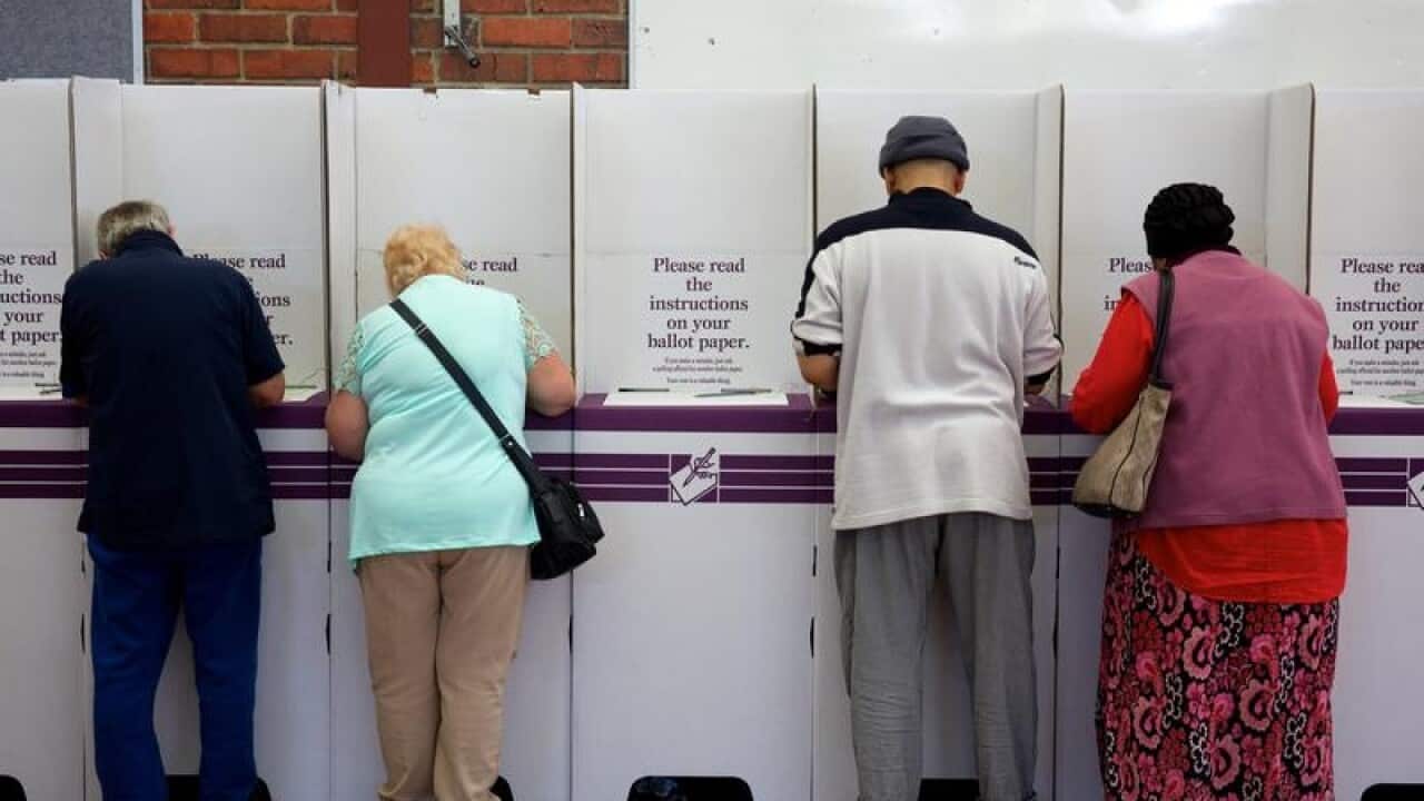 Members of the public casting their vote