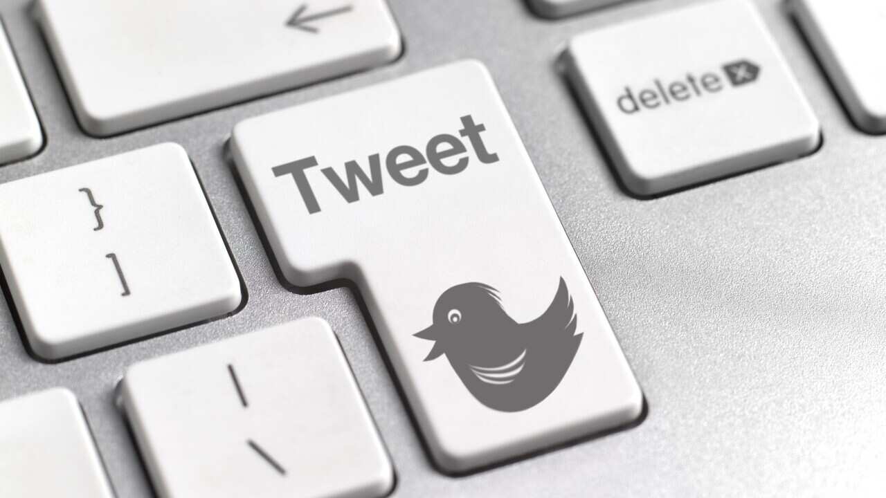 A button on keyboard labelled 'Tweet.'