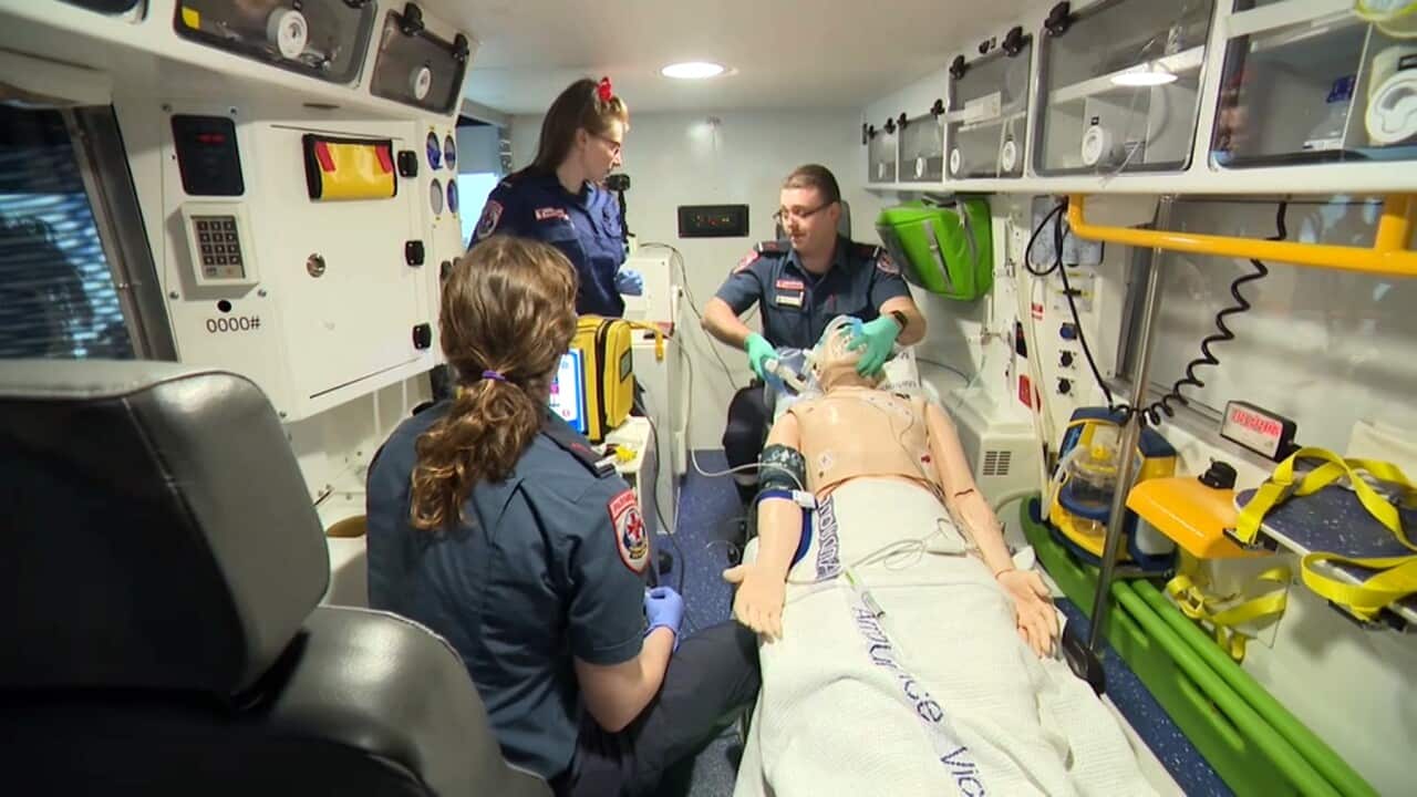 Paramedics in a training scenario